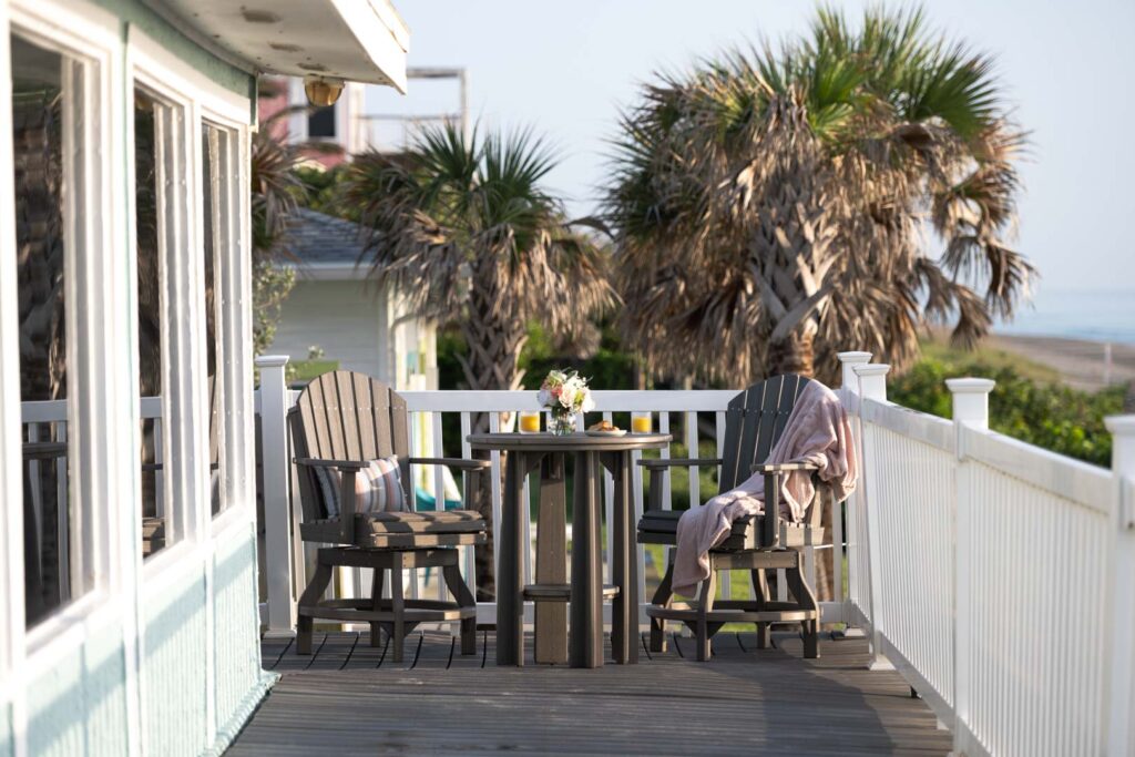 Balcony-Table-and-swivel-glider-chairs_Coastal-Gray